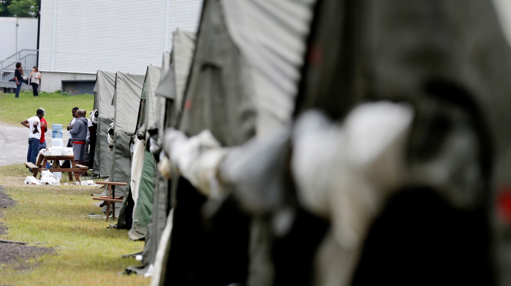 Tents housed asylum seekers in Quebec near the Canada-US border in August [Christinne Muschi/Reuters]