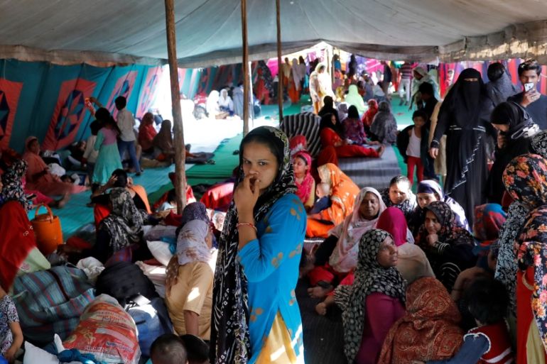 Muslims sit inside a relief camp in Mustafabad in the riot-affected northeast of New Delhi