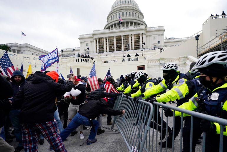 Supporters of Donald Trump riot at the US Capitol on January 6, 2021.