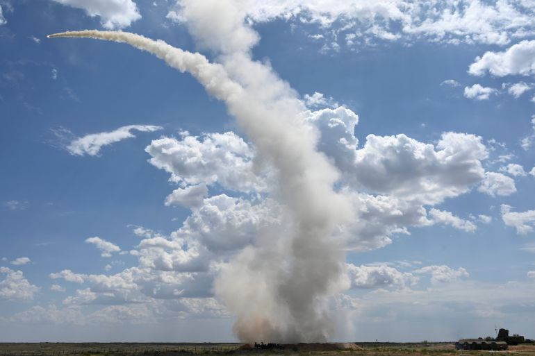 A Russian S-300 air defence system launches a missile during military exercises at the Ashuluk shooting range near Astrakhan, Russia.