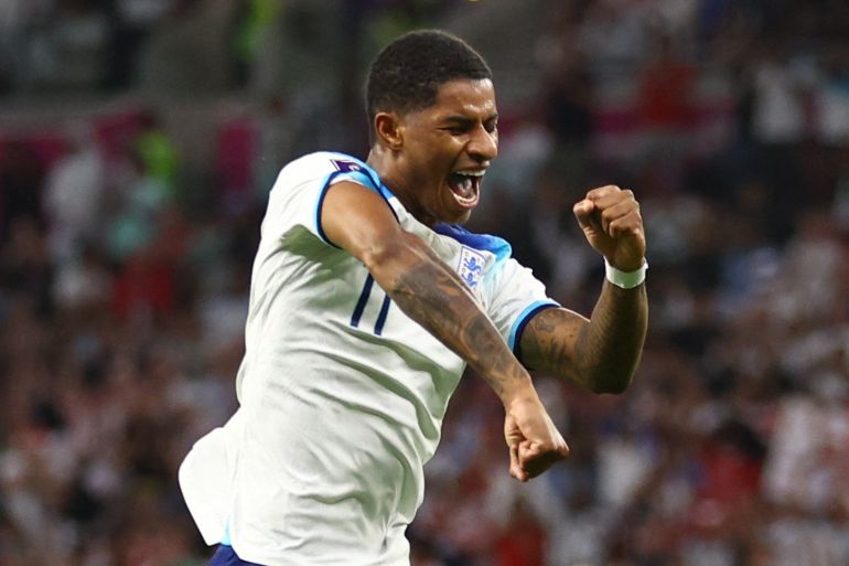 m, Al RayyaEngland's Marcus Rashford celebrates scoring their third goal