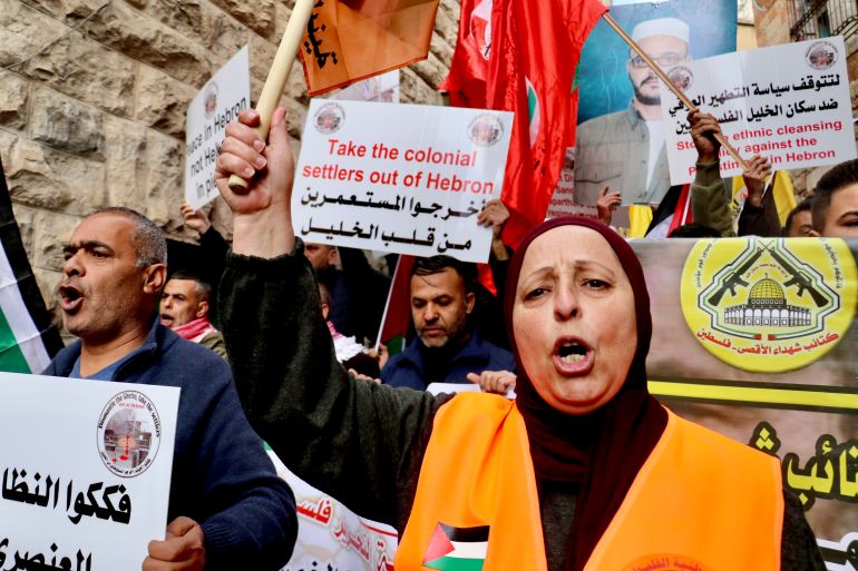 Palestinians protesting the on the anniversary of the Ibrahimi mosque massacre by an American-Israeli settler
