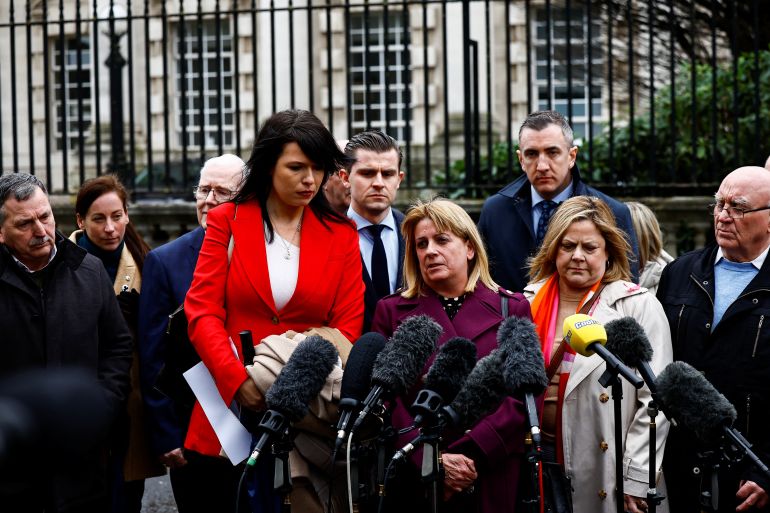Troubles victims Martina Dillon and Lynda McManus, along with Amnesty International UK's Deputy Director for Northern Ireland Grainne Teggart, attend a press conference outside the Royal Courts of Justice after a High Court judgment was heard, in a landmark legal challenge to the UK government's Troubles Legacy Act, in Belfast, Northern Ireland, February 28, 2024. REUTERS/Clodagh Kilcoyne
