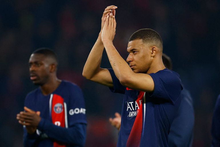 Paris St Germain's Kylian Mbappe looks dejected