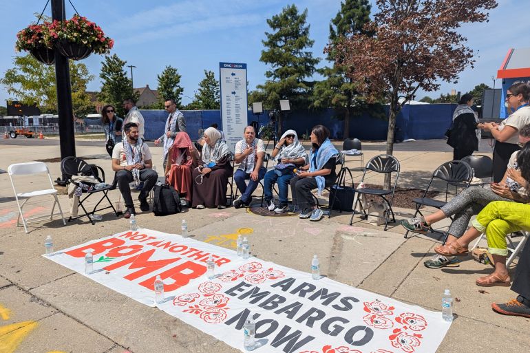 Uncommitted delegates stage a sit-in outside the Democratic National Convention in Chicago, August 22, 2024