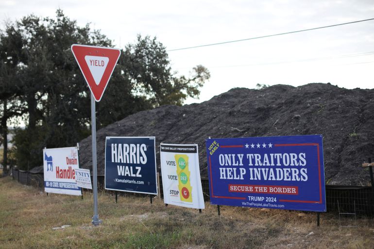 Election signs in support of Democratic presidential nominee U.S. Vice President Kamala Harris and Republican presidential nominee and former U.S. President Donald Trump