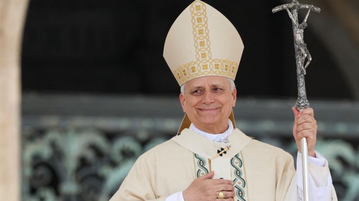 Pope Leo XIV gestures at the end of his inaugural Mass in Saint Peter’s Square.