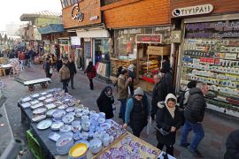 People shop at the stores in Tajrish Bazaar, in Tehran on January 28, 2026.